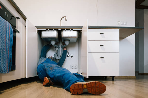 Professional Emergency Plumber technician working in Olathe, CO